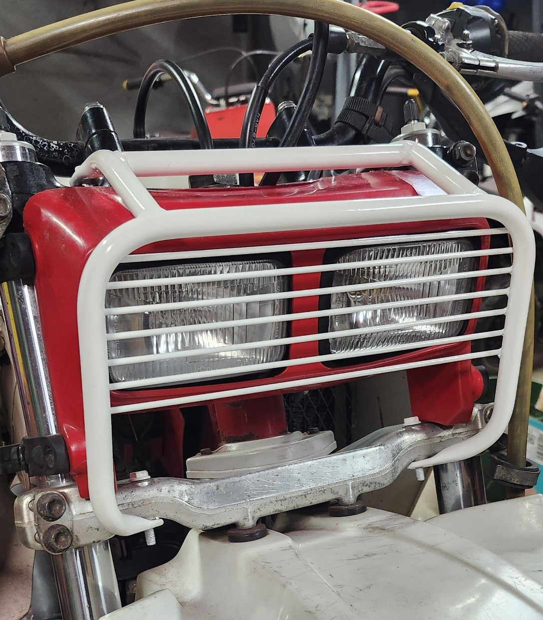 1985-1986 Honda ATC350X Headlight guard With Cross guards.